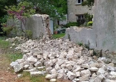 Démolition d'un mur en pierre à saint Maur