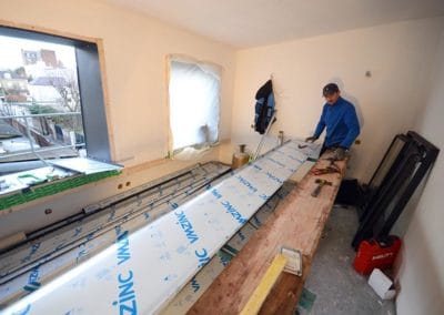 Couverture en zinc d'une maison en bois à Asnières