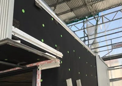 Pose bardage alu sur maison en bois