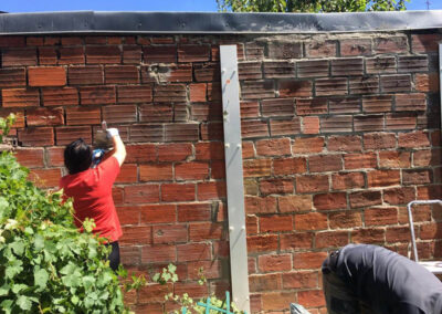 Rénovation du mur en brique mitoyen