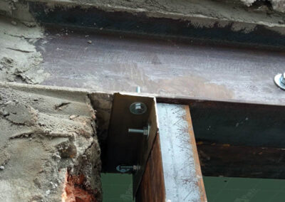 Percement de façade avec pilier et poutre en acier