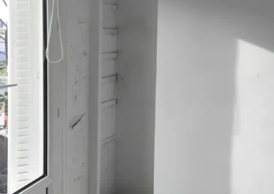 Isolation d'un mur d'appartement parisien